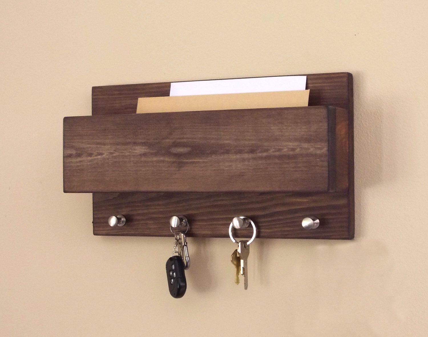 key holder for wall with door