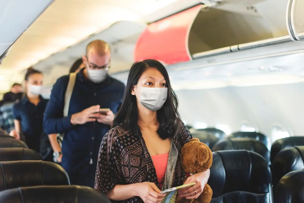 girl travelling with mobile iv